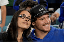 Los Angeles Chargers quarterback Justin Herbert and girlfriend Madison Beer watch the Toronto Blue Jays and the Los Angeles Dodgers compete during the seventh inning in Game 3 of baseball's World Series, Monday, Oct. 27, 2025, in Los Angeles. (AP Photo/Ashley Landis, File)