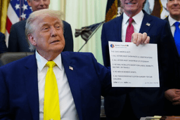 President Donald Trump holds up an image taken from his Truth Social account at an event about coal, Thursday, June 4, 2026, in the Oval Office of the White House in Washington. (AP Photo/Julia Demaree Nikhinson,File)