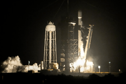 A SpaceX Falcon 9 rocket lifts off from pad 39A with a payload of a pair of lunar landers at the Kennedy Space Center in Cape Canaveral, Fla., Jan. 15, 2025. (AP Photo/John Raoux, File)